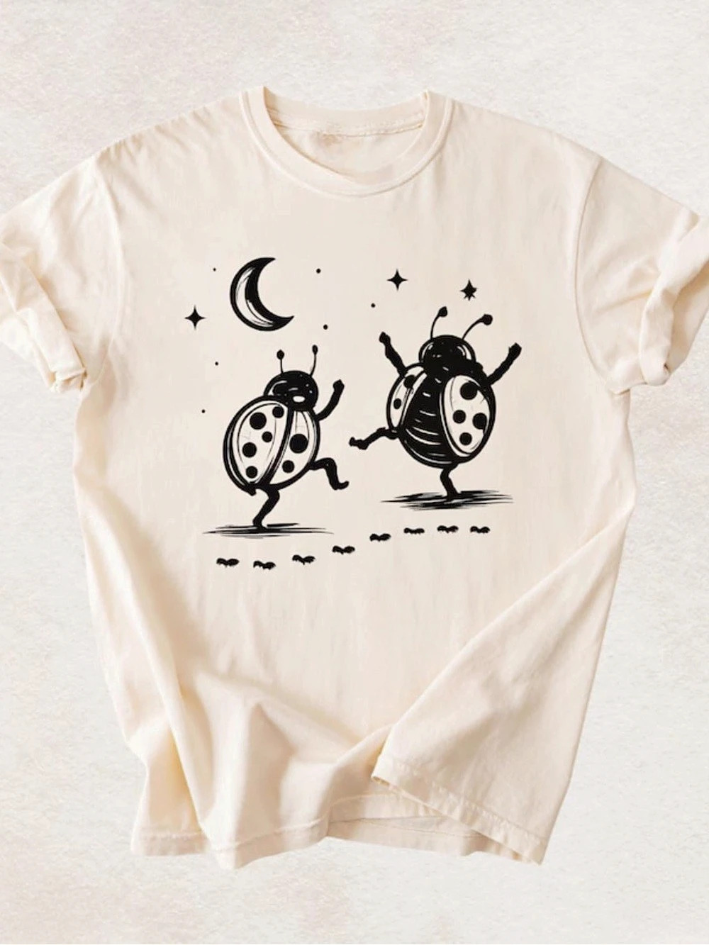 Vintage LadyBug Dancing Graphic Tee in Off White